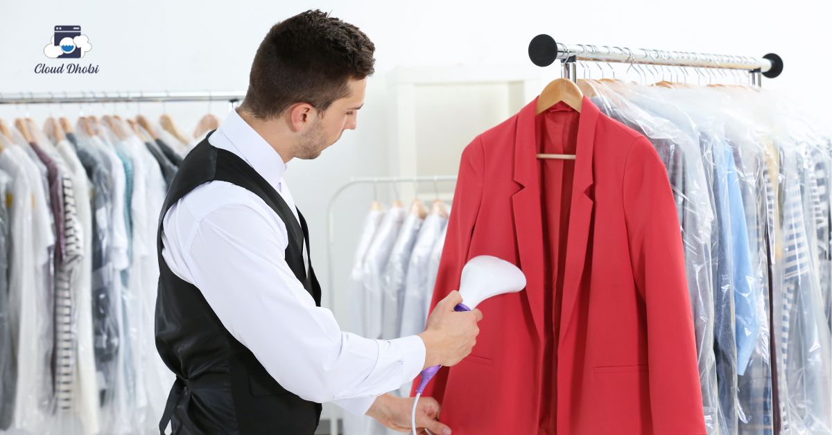 Professional dry cleaners handling designer luxury clothes