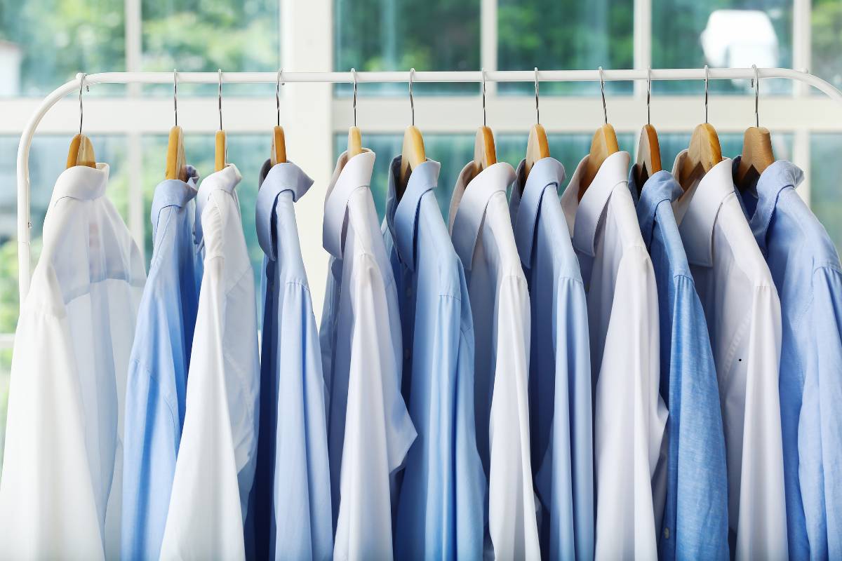 Customer receiving garments with dry clean cost tag