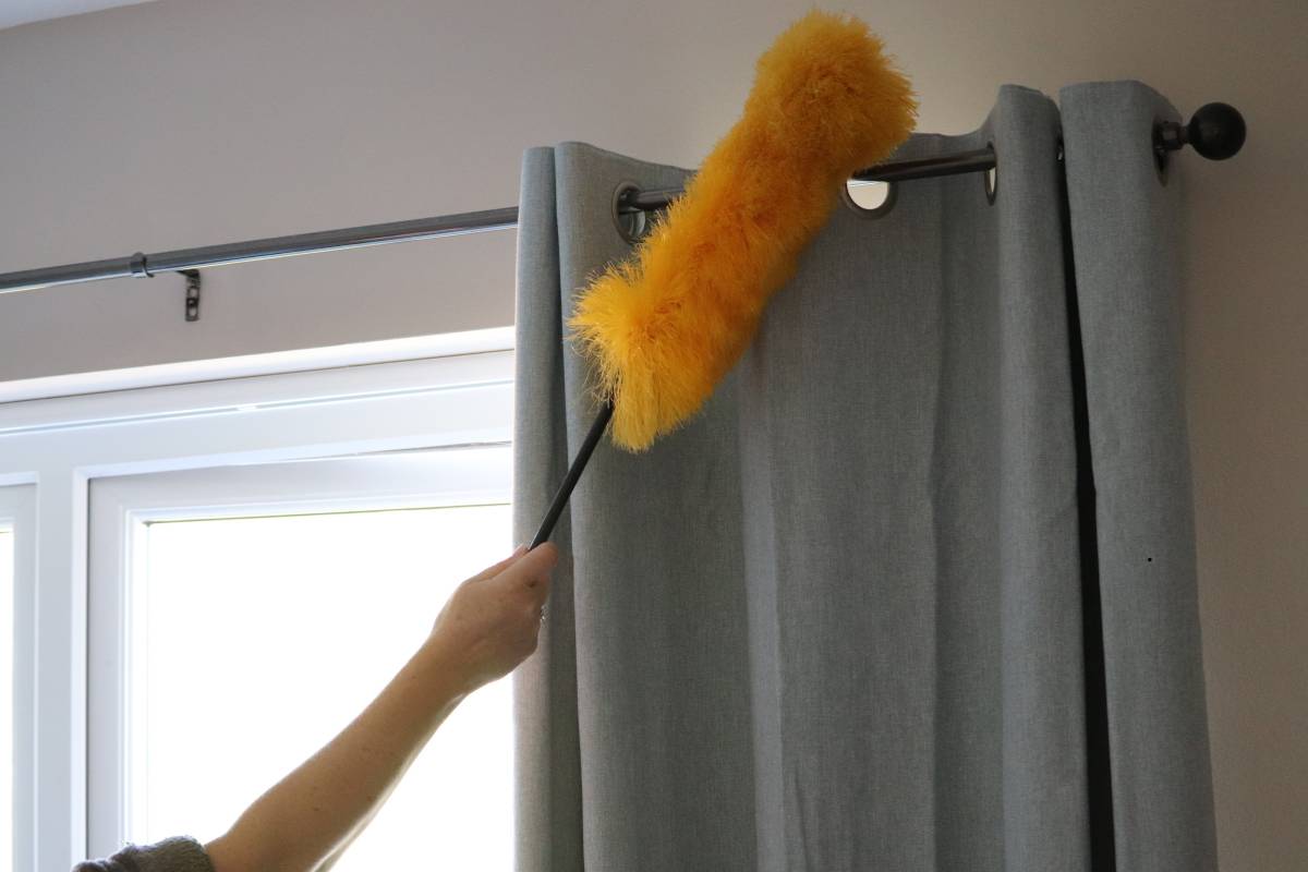 Professional curtain cleaning showing curtain dry cleaning cost in Delhi