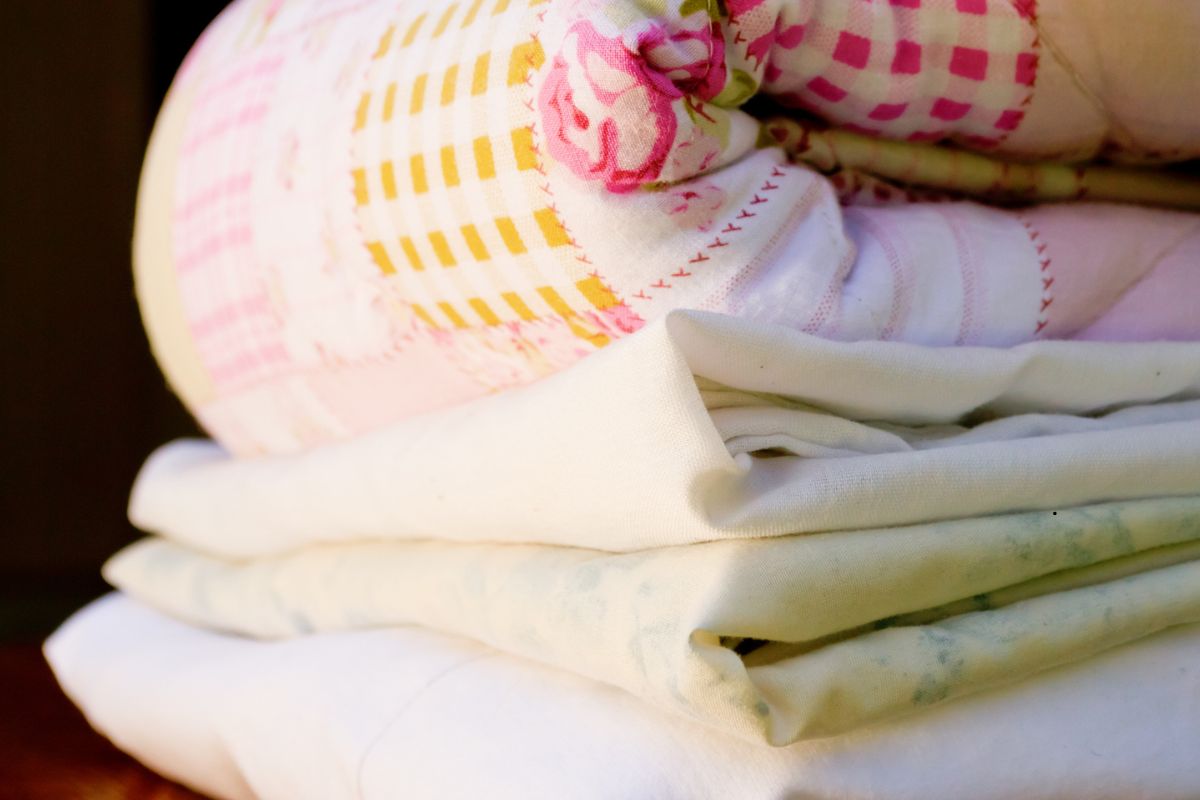 Large double bed blanket neatly folded after dry cleaning, showing Double Bed Blanket Dry Clean