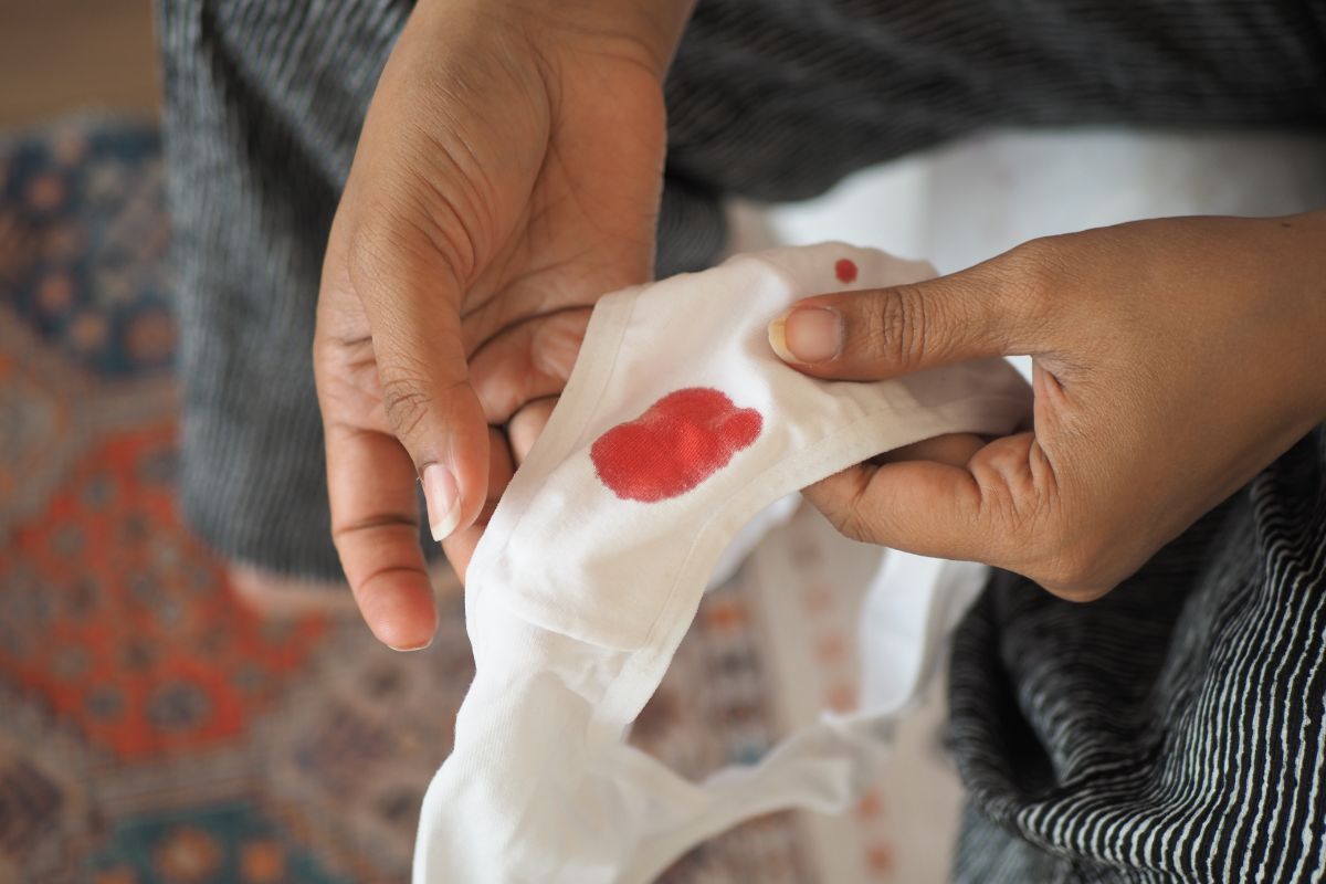 Cloud Dhobi team handling remove blood stains from clothes in Delhi NCR